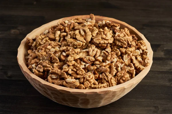 Closeup Rustic Wooden Bowl Walnuts Board — Foto Stock