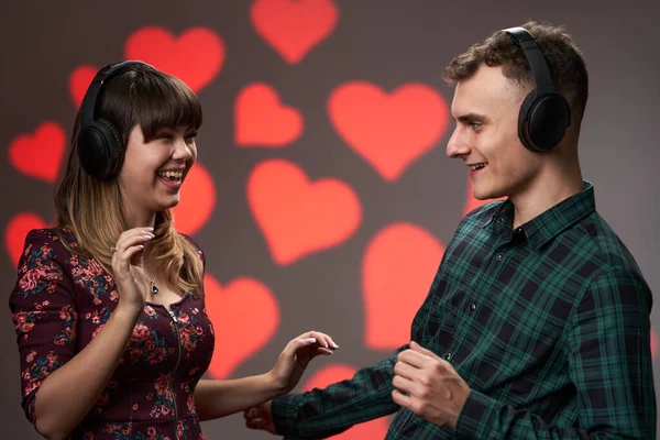 Lovely Young Couple Dancing Headphones Having Fun Hearts Background Valentine — Stock Photo, Image