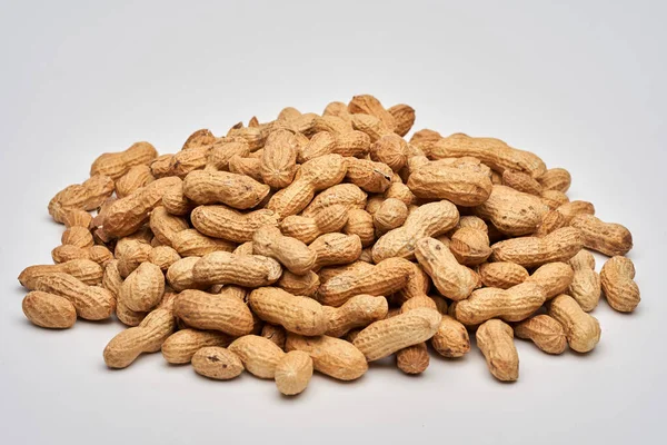 Closeup Pile Dried Peanuts Isolated White Background — Stock Photo, Image