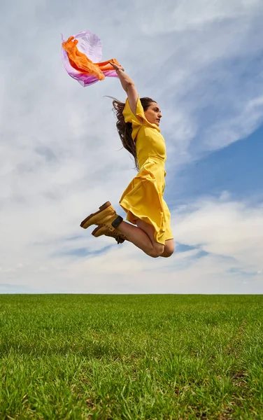Happy Young Woman Yellow Dress Jumping Outdoor Green Wheat Field — Foto de Stock