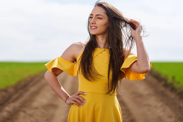 Young Woman Yellow Dress Dirt Road Wheat Fields — Stock Fotó
