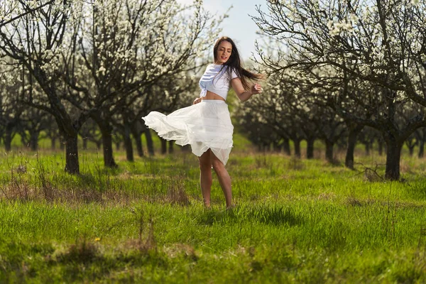 Portrait Beautiful Caucasian Woman White Dress Blooming Plum Orchard — Fotografia de Stock