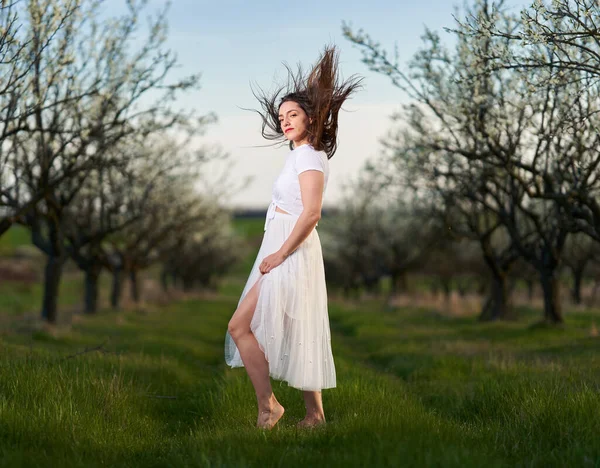 Portrait Beautiful Caucasian Woman White Dress Blooming Plum Orchard — Stock Fotó