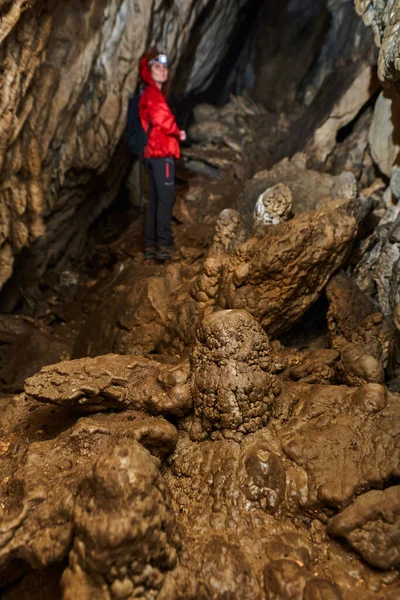 Woman Headtorch Exploring Very Old Cave Beautiful Speleothems — Fotografia de Stock