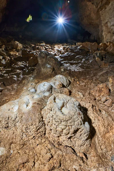 Woman Headtorch Exploring Very Old Cave Beautiful Speleothems — Zdjęcie stockowe