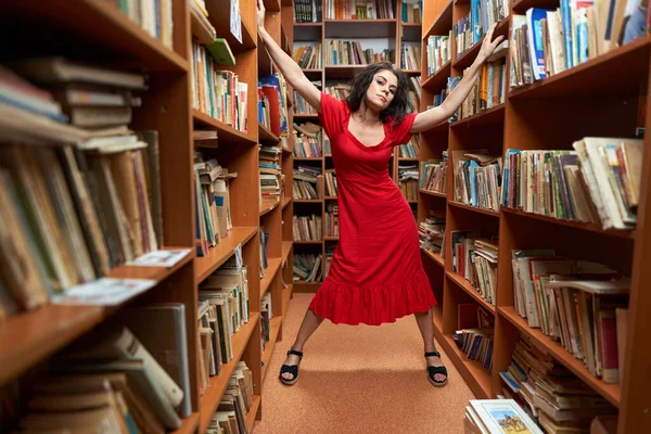 Attractive Brunette Librarian Red Dress Library Full Books — Stockfoto