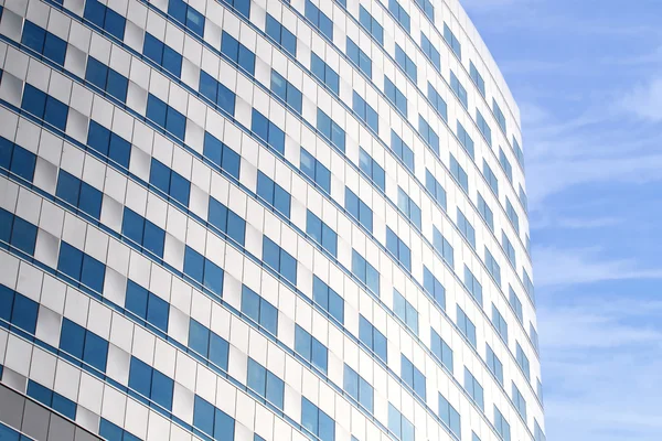 Modern round building on blue sky background — Stock Photo, Image