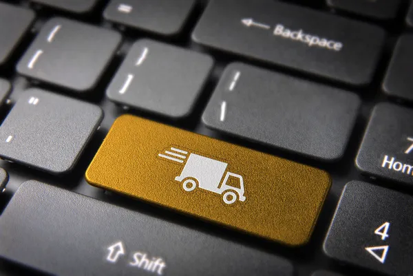 Yellow delivery keyboard key cargo business background — Stock Photo, Image