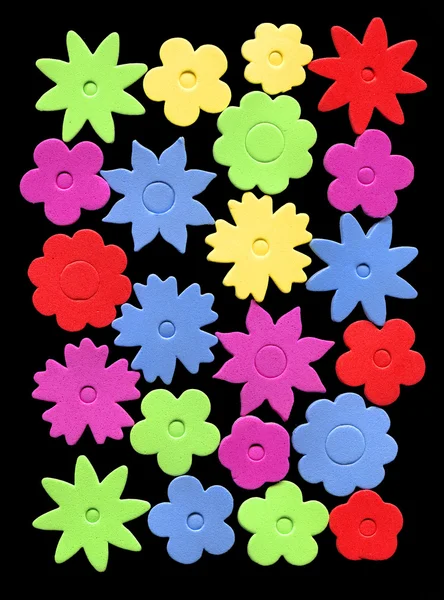 Färgstark blomma bakgrund på svart — Stockfoto