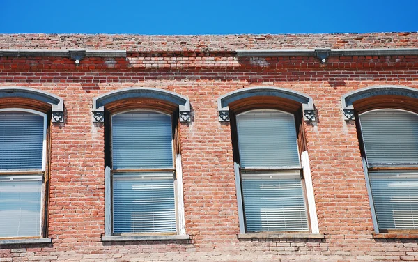 Old brick building and windows — Stock Photo, Image