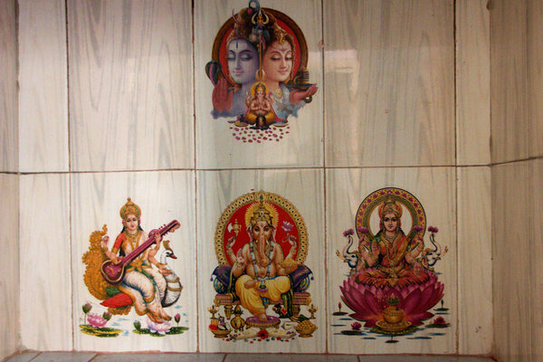Colour pictures of Shiva, Parvati, Mahasaraswati, and Lakshmi printed on ceramic tiles