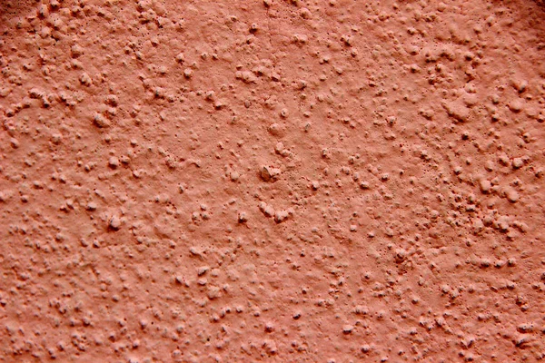 Close Van Roze Beschilderde Betonnen Wand Met Grove Zandkorrels — Stockfoto