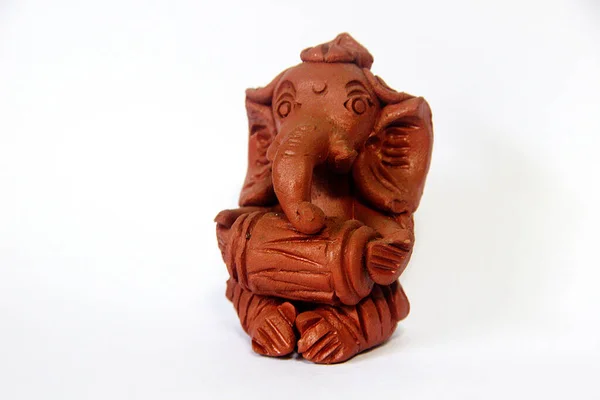 Earthen Sculpture Drum Beating Ganesha Sitting Position Painted Brown Isolated — Stock Photo, Image