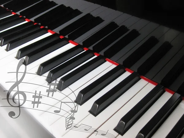 Pianotoetsen met noten, muzikale achtergrond. — Stockfoto