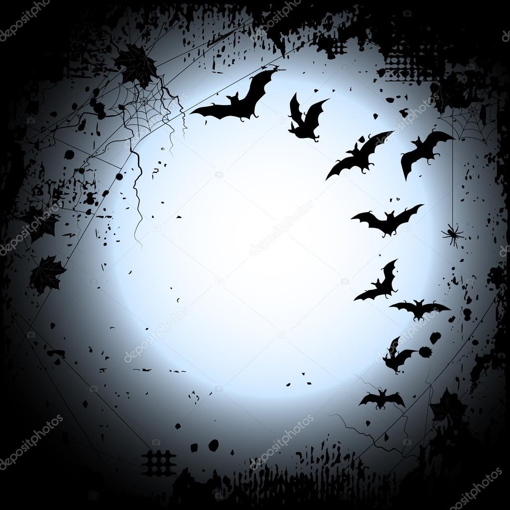 Halloween background with a full moon and bats