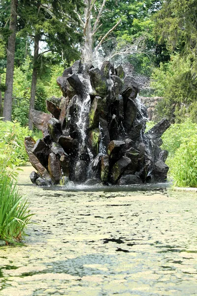 Steinwasserbrunnen Stockbild