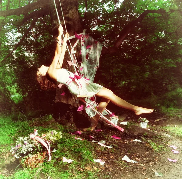Girl on the swing — Stock Photo, Image