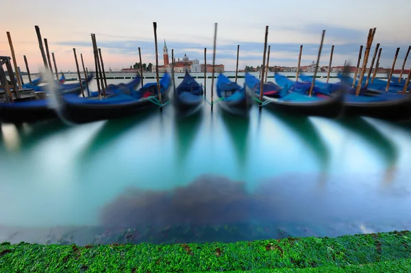 Venetian gondolas at sunrise — Stock Photo, Image