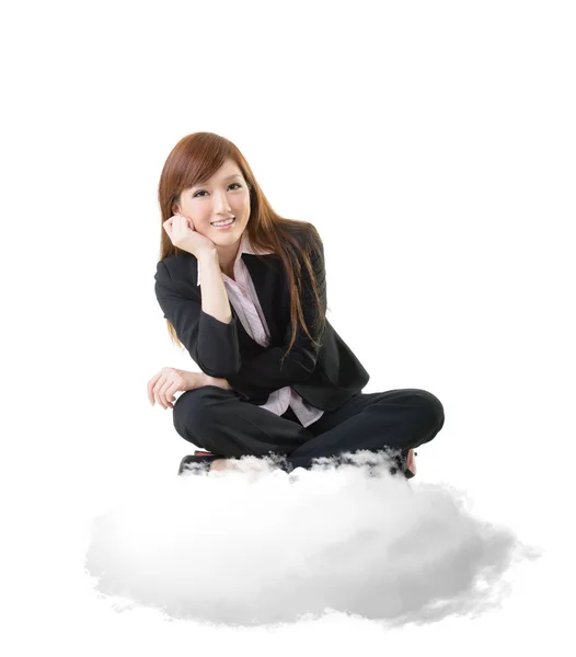 Business woman sit on cloud — Stock Photo, Image
