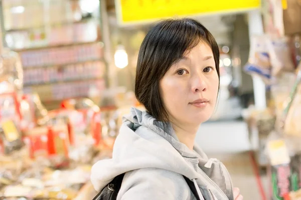 Mature Asian women at street — Stock Photo, Image