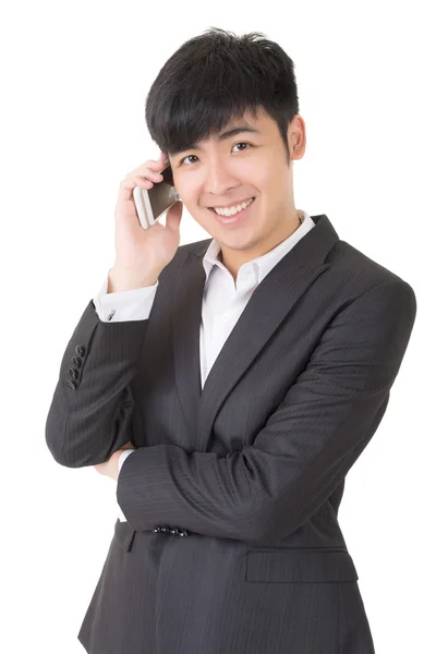 Glücklich lächelnder Geschäftsmann nutzt Handy — Stockfoto