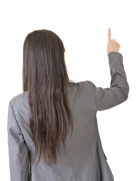 Retrato de uma jovem mulher asiática apontando e selecionando de volta — Fotografia de Stock