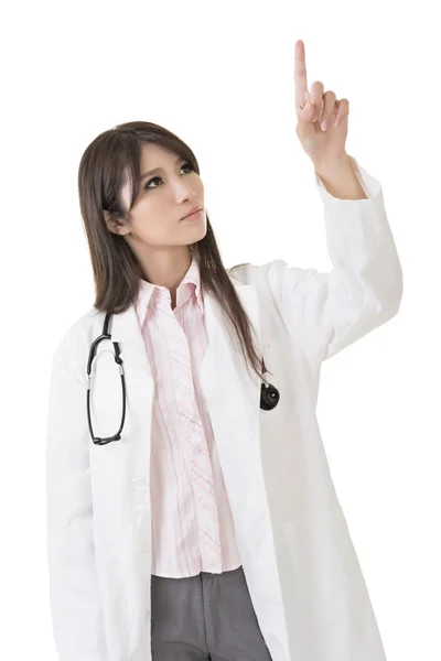 Médecin femme avec stéthoscope et pointe des doigts — Photo