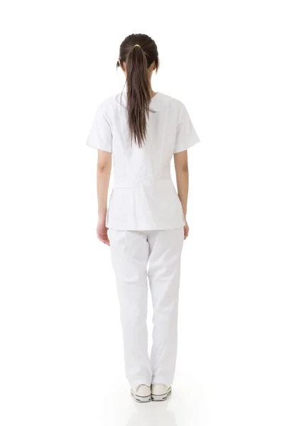 Attractive asian nurse from a back — Stock Photo, Image