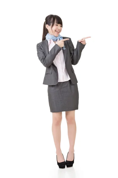 Attractive business woman showing or pointing. — Stock Photo, Image