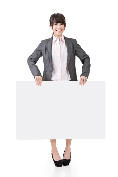 Asian business woman hold empty blank board — Stock Photo, Image