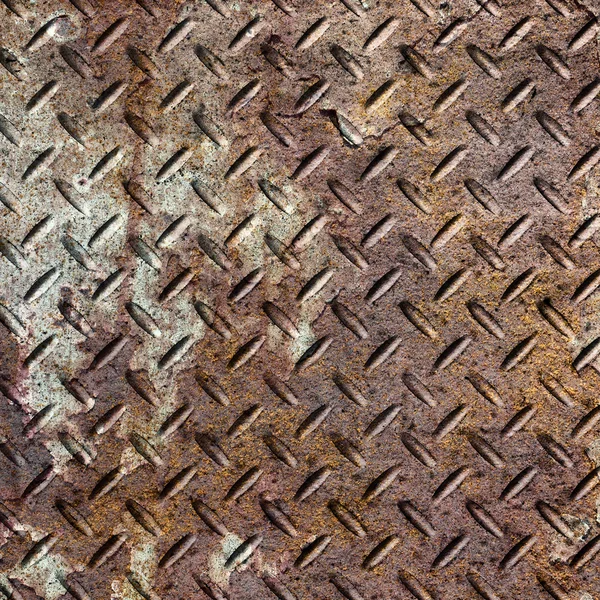 Background of old metal diamond plate in brown color. — Stock Photo, Image