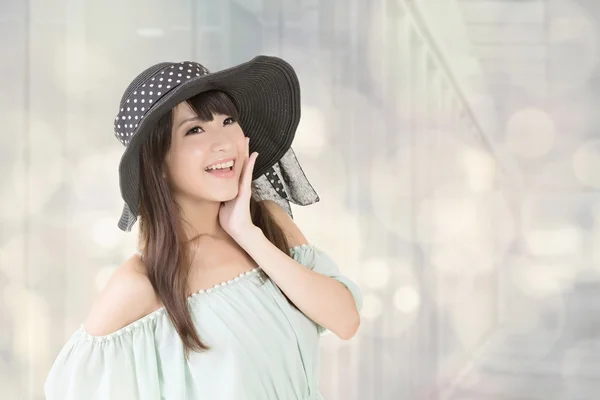 Elegant asian woman with hat — Stock Photo, Image