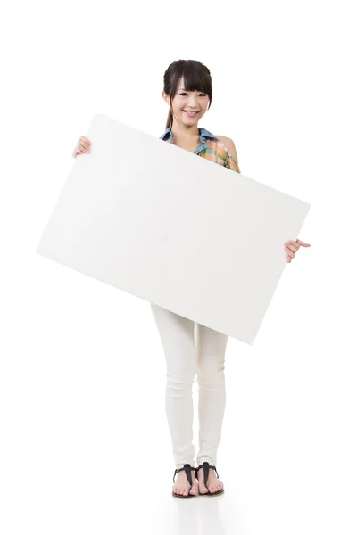 Attractive young asian woman holding blank board — Stock Photo, Image