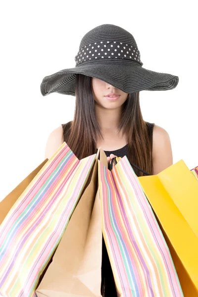 Attractive asian woman holding shopping bags — Stock Photo, Image
