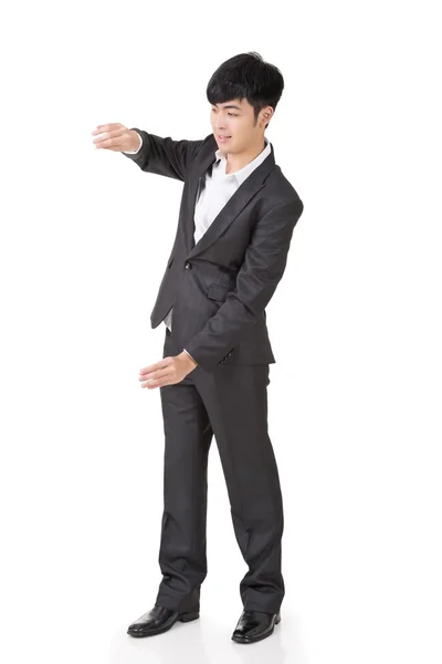 Businessman holding something — Stock Photo, Image