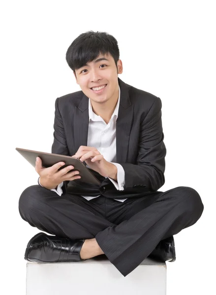 Asian businessman use pad — Stock Photo, Image