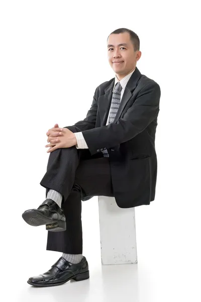 Friendly Asian business man sit — Stock Photo, Image