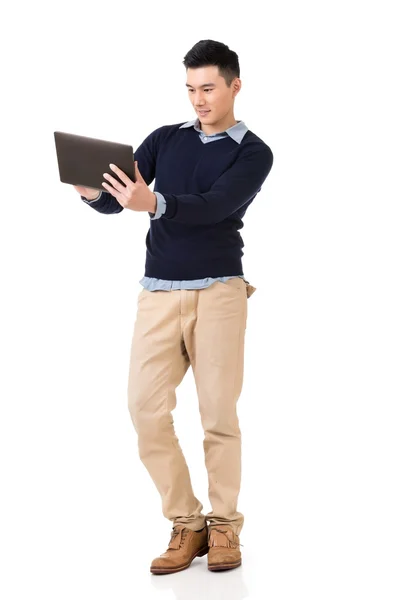 Asian man using pad — Stock Photo, Image