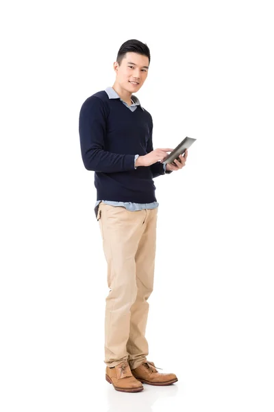 Asian man using pad — Stock Photo, Image