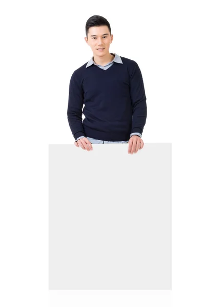 Asian man holding a blank board — Stock Photo, Image