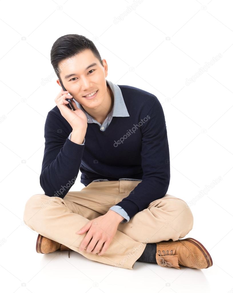 man of Asian take a call