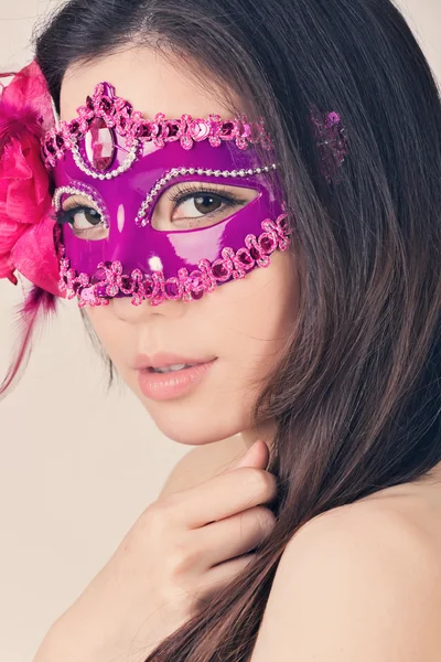 Beautiful woman in a carnival mask — Stock Photo, Image