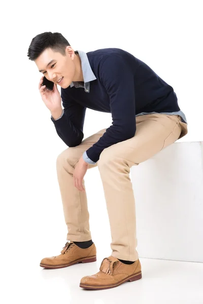 Sit and take a call — Stock Photo, Image