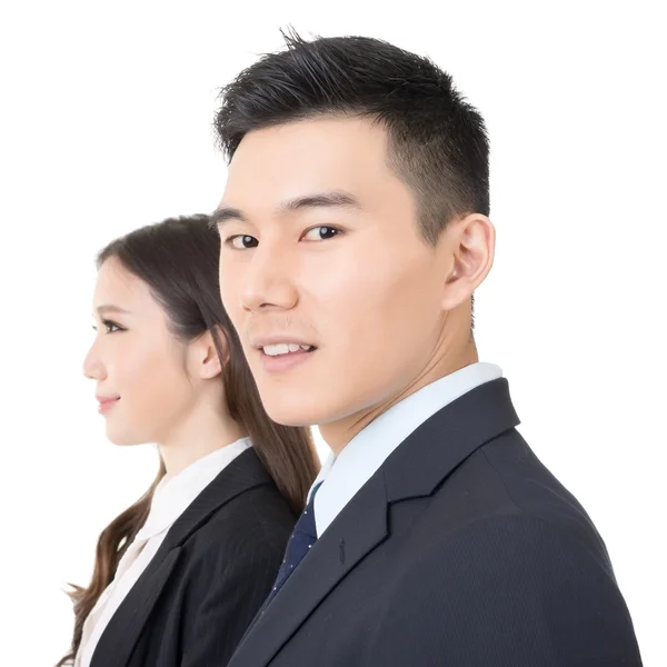 Vista lateral de hombre y mujer de negocios jóvenes —  Fotos de Stock