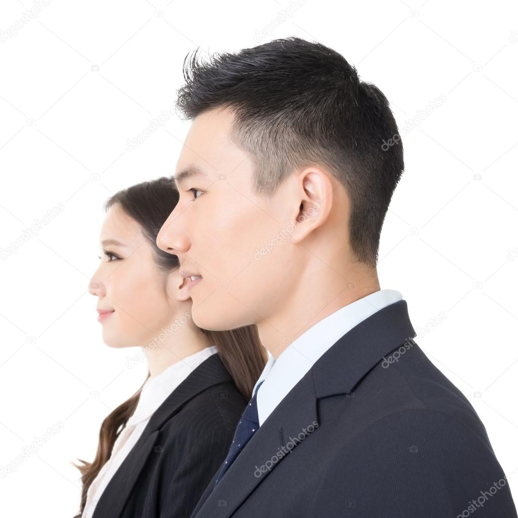 Side view of young business man and woman