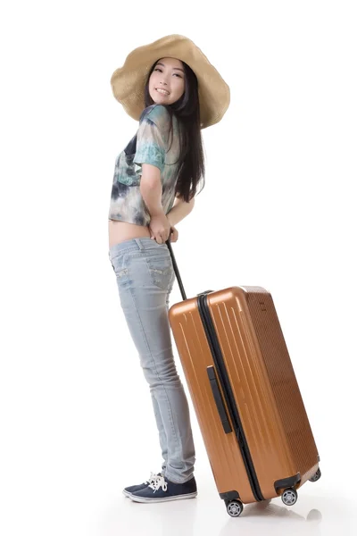 Aufregende asiatische Frau ziehen ein Gepäck — Stockfoto