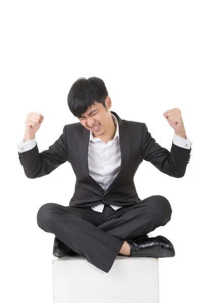 Young asian businessman sit and feel freedom — Stock Photo, Image