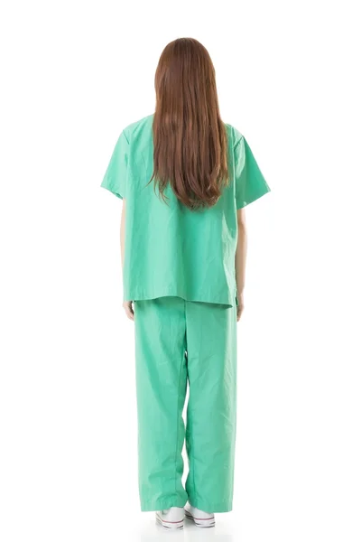 Bakifrån av asiatiska doktor kvinna bära en isolering klänning eller operati — Stockfoto