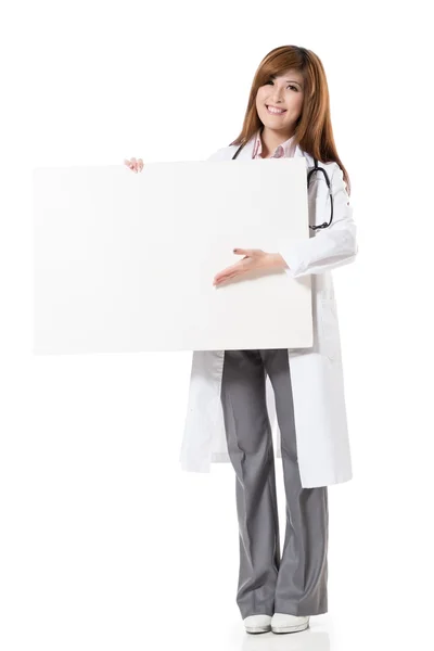 Asian doctor woman holding blank board Royalty Free Stock Images