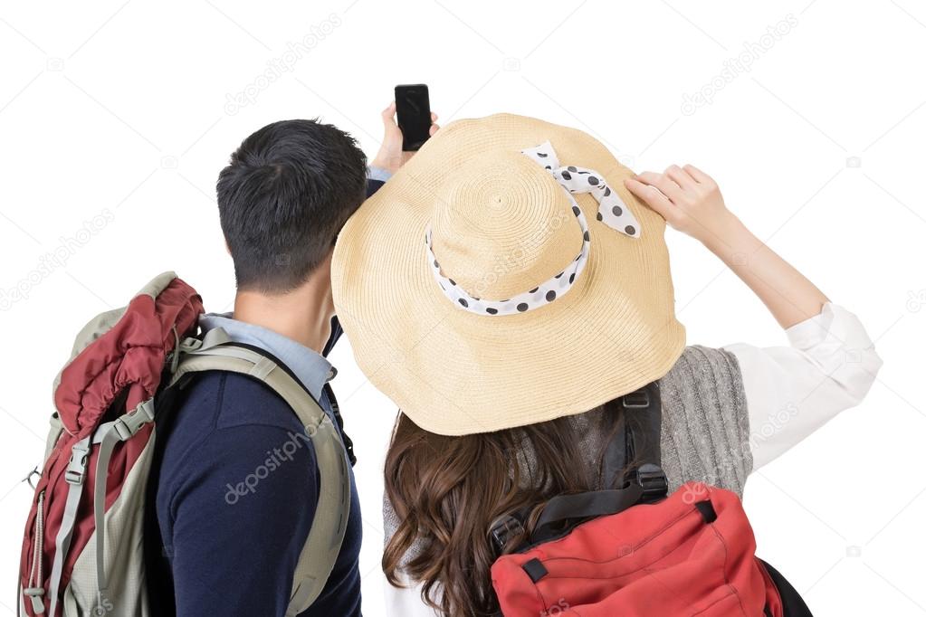 Asian young traveling couple selfie